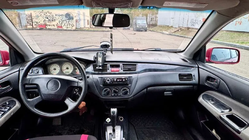 Lancer 2005 ✅цена-379000 (торг) продаётся mitsubishi lancer 2005 г. в., автомат, двигатель 1.6. хорошее состояние, кондиционер, 4 стеклоподъёмника, центральный замок. стоит зимняя шипованная резина. красивый красный цвет. по ходовой нареканий нет, двигатель работает спокойно и тихо, коробка не пинает. установлена магнитола с bluetooth, usb и aux. стоит новый аккумулятор. прошу не забывать что машине 20 лет. ✅цена-379000 (торг) +79494153100 - фотография - 9