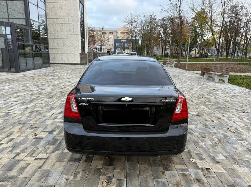 Продам chevrolet lacetti конец 2008 года куплено в 2009-м 1.6 механика пробег 151000 тыс родной, автомобиль в родной краске за исключением переднего левого крыла все стекло родные включай лобовое техническая часть в идеальном состоянии полностью все обслужено имеются заказ наряды! салон в идеальном состоянии никогда никто не курил комплектация с климатом задний парктроник четыре стеклоподъемника два комплекта ключей повторюсь машина в идеальном состоянии такую lacetti не часто встретишь осмотр город мариуполь цена 715000тыс по всем вопросам звоните +79497195733 - фотография - 5