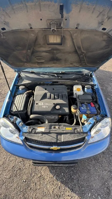 Продам chevrolet lacetti 1.6 мт 2007 машина в одних руках 15 лет, в достойном состоянии пробег 230.000 2 хозяина за всю историю производства южной кореи. птс оригинал. кузов весь в родной краске, дтп не было. салон чистый, в машине ни когда не курили. из опций :гур, abs, airbag, кондиционер, все электростеклоподъёмники, электрозеркала с подогревом и электро регулировкой, музыка (есть управление с руля), литые диски, противотуманные фары отличная сигнализация с обратной связью, с радиусом действия около 1 км. есть зимняя резина на дисках. я второй владелец. в прошлом году заменён новый оригинальный компрессор кондиционера и радиатор, произведен полный кап. ремонт системы кондиционирования. в прошлом месяце установлены новые хорошие тормозные диски с колодками. за время эксплуатации много чего менялось, машина обслуживалась, все в рабочем состоянии. сервисные книжки, 2 ключа юридически чистая, полное переоформление. цена 580.000 рублей торг будет реальному покупателю ! т 📞 звоните: +7(949)0750712 - фотография - 5