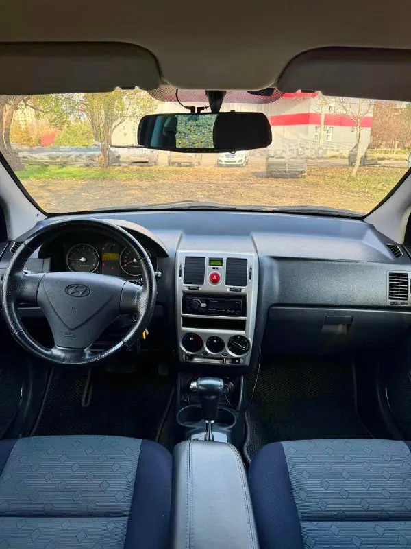 Hyundai getz at 💰цена: 600 000р 🏢город: мариуполь 📅год выпуска: 2006 🧾пробег: 165 568 ем ⚙️двигатель: 1.4 ⛽топливо: бензин ⚙️кпп: автомат 📞 телефон: +7-949-727-41-51 +7-989-263-55-56 +7-949-551-91-52 💾 описание: ✅ кузов в отличном состоянии ✅ техническая часть на 5+ ✅ южная эксплуатация ✅ салон как новый ✅ коробка автомат кондиционер ❄️ (работает отлично), подогрев сидений 🔥, abs, airbag, 4 стеклоподъемника, задние дисковые тормоза, гидроусилитель руля, электро зеркала, два ключа, птф, регулировка сиденья по высоте, сигнализация, магнитола с usb. улица шевченко 269 - фотография - 8