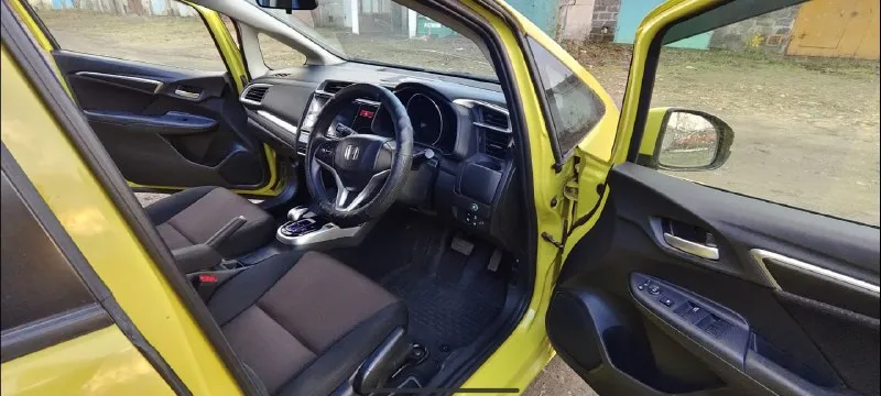 ⚡продам срочно!!!⚡ 💥по низу рынка❗💥 💫 honda fit 2014 год, 1,5 бензин (гибрид), автомат, передний привод, 195 тыс пробег. авто в отличном состоянии, чистокровный японец, в машине работает всё! ✅климат, без ключевой доступ, старт/стоп, 4эл. стеклоподъёмника, мультируль, головное устройство android с навигацией, режим eko, 2 ключа, свежая резина на дисках. ✅выглядит очень хорошо, салон не затертый, кузов без рыжиков. очень динамичный и экономичный авто, расход по паспорту 3л/100, разгон 8,4 сек. 🚀 переоформление без проблем, могу присутствовать в мрэо. цена 850тыс. руб. тел: +79495197928 📞 звоните: +7(949)5197928 - фотография - 7