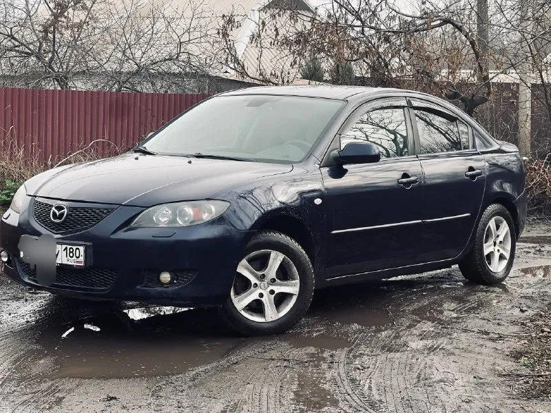 Продам mazda 3 1.6 газ/бензин мкпп 2006 г. в. 290.000 родного пробега не гнилая, без рыжиков хорошее... - фотография