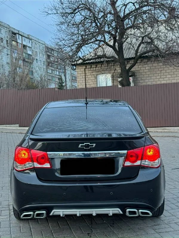 Chevrolet cruze 1.8 ат 2011г chevrolet круз пробег 238.000 км мотор отличный, без проблемный, не дым... - фотография