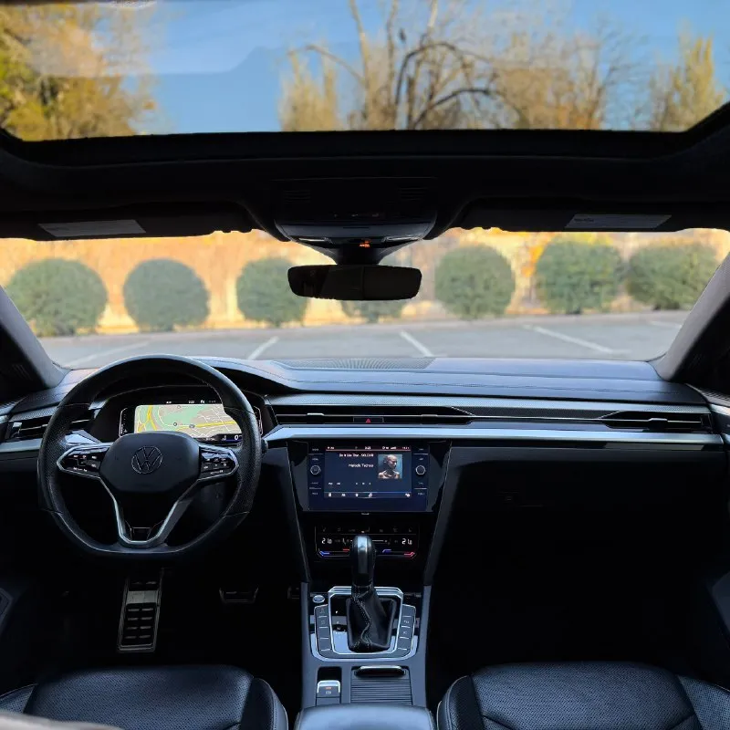 🚗 2021 volkswagen arteon sel premium r-line 2.0t, 8at, 4motion ключевые факты • пробег: 39100км. • двигатель: 2.0 tsi (ea888), ~280л. с., 350 н·м • кпп: 8-ступ. автомат (aisin) • привод: полный 4motion • комплектация: sel premium r-line (топ) — кожа nappa, панорама, harman/kardon, ассистенты iq. drive основные данные • год / модельный год: 2021 / my2021 • марка / модель / кузов: volkswagen arteon — лифтбек • цвет кузова / интерьера: черный / черный • двигатель: 2.0 tsi, турбо, непосредственный впрыск, ~280.л. с., 350 н·м • трансмиссия / привод: 8at / 4motion комплектация и опции (sel premium r-line) • безопасность/ассистенты: front assist (aeb), acc (адапт. круиз), lane assist, blind spot + rear traffic alert, park assist, камера 360°, парктроники по кругу, auto-hold, tpms • свет: full led с динамическим поворотом, автодальний (light assist), led дхо/фонари • ходовая: dcc (адаптивные амортизаторы) с режимами comfort/normal/sport/individual, диски 20″ r-line • интерьер/комфо 📞 звоните: +7(949)4965859 - фотография - 6