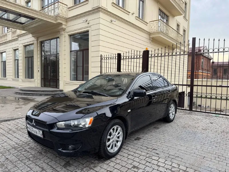 Продам mitsubishi lanser 10 максимальная комплектация, 2011 год, пробег 167.000 двигатель 1.6 кпп ме... - фотография
