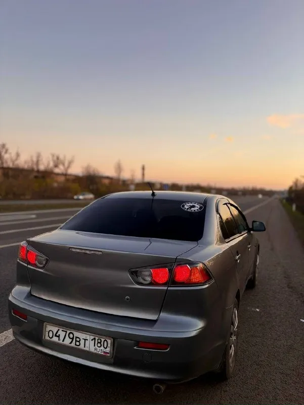 Продам личный автомобильный mitsubishi lancer 10 1.6 л на механике 2012 год пробег 195.000 цена 870.... - фотография