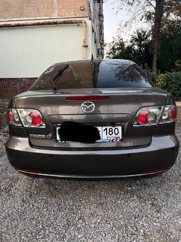 Продаю mazda 6 2006 пробег 250 000 км (реальный) один владелец по птс машина в одних руках 5 лет. без дтп с серьёзными повреждениями (есть лёгкие косметические дефекты в виде царапин). техническое состояние - двигатель 1.8 бензин, в хорошем рабочем состоянии, без посторонних стуков. масло менялось каждые 7–10 тыс. км. - коробка передач: механическая переключается плавно, без рывков. - подвеска обслужена: рычаги и стойки заменялись ~500 км назад. комплектация и оборудование - кондиционер/климат-контроль - электростеклоподъёмники, центральный замок - музыкальная система с поддержкой usb/aux/bluetooth - подушки безопасности: фронтальные (и боковые, ) - зимняя резина - сигнализация - кузов в общем хорошем состоянии, есть мелкие сколы и царапины соответствующие возрасту. - лобовое стекло без крупных трещин, возможны небольшие сколы. - птс: оригинал, без залогов и ограничений. - - последнее то проведено (10.09.2025). донецк +7949306302 +79493174030 650.000 торг - фотография - 3