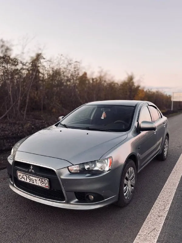 Продам личный автомобильный mitsubishi lancer 10 1.6 л на механике 2012 год пробег 195.000 цена 870.... - фотография