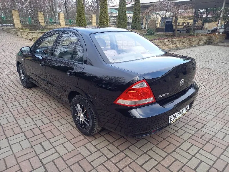Продам nissan almera classic 2007 год выпуска объем 1.6 кпп механика авто не пригнано покупали в донецком автосалоне 1 хозяин авто в хорошем состоянии вложений не требует, в дтп не участвовала в родном окрасе, родное остекление, два ключа сервисная книга, новая зимняя резина, цена:520 000 руб торг ! остальные вопросы по телефону +7-949-096-71-49 - фотография - 2