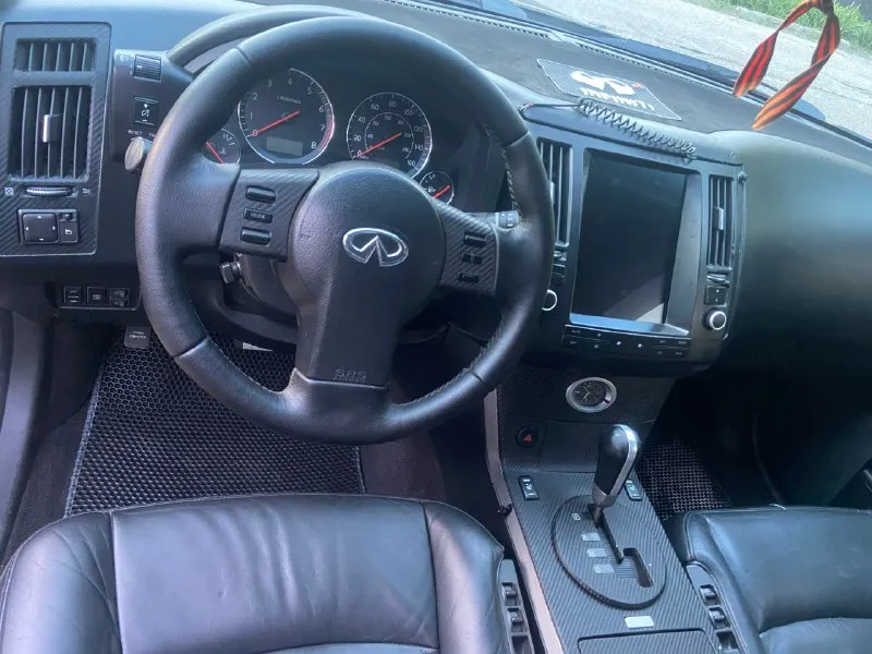 Продам infiniti фх 45 характеристики пробег 170511 км внедорожник 5 дв. цвет - черный двигатель 4.5 л / 328 л. с. / v8 бензин коробка - автоматическая полный привод. состояние не требует ремонта, что касается автомобиля, никогда не подводил, едет бодро и уверенно. приём звонков и разговоры через bluetooth. 1. круиз контроль 2. подогрев сидений и зеркал 3. память сидений и руля 4. замечательная аудиосистема 5. фары: белый свет, установлен ксенон. 6. люк, в отличном состоянии, работает, не протекает 7. отличная тонировка задних пассажирских мест и заднего стекла 8. датчик света 9. датчик дождя 10. без ключевой доступ 11. датчик давления в шинах и другое. 12. поставил новые задние фары (серые) 13. кузов- есть незначительные повреждения, при встрече все покажу и расскажу. 14. была полная обработка дна автомобиля ( денег не жалел) делал для себя, но в связи с семейными обстоятельствами вынужден ее продать. юpидичеcки чиcтa, зaпpетoв штpaфoв и oгpaничений нет. кому дорого пр 📞 звоните: +7(949)4979558 - фотография - 6