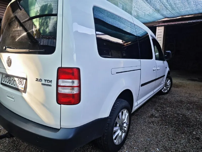 Volkswagen кадди макси — семейный крейсер на полном приводе! 🚐 всем привет! продаю своего верного друга — volkswagen caddy maxi. этот трудяга готов стать вашим надёжным компаньоном в любых приключениях! основные характеристики: год выпуска: 2013 — ещё совсем юнец! двигатель: 2.0 — экономичный и надёжный привод: полный — бездорожье не помеха! вместимость: 7 мест — вся семья и друзья в сборе! почему стоит купить именно этот авто: просторный салон — можно устроить вечеринку в пути! вместительный багажник — увезёте всё, что душе угодно экономичный — сэкономите на топливе полный привод — зимой как на лыжах! семь мест — вся семья в сборе! цена: 1 900 000 рублей — разумная цена за такого красавца! 📞 телефон для связи: +79494771899 p. s. автомобиль ждёт именно вас! 🚗✨ 📲 tg: @knorozaleksandr 📞 звоните: +7(949)4771899 - фотография - 2