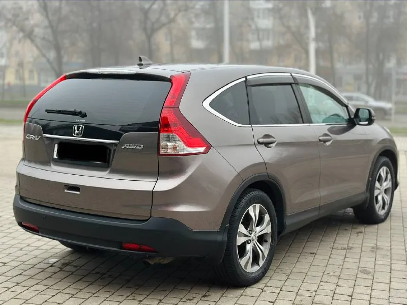 Honda cr-v 2.4 автомат бензин 2015г автомобиль в хорошем состоянии не каких вложений не требует! автомобиль в родном окрасе!!! 1 собственник из самого автосалона!!!! подогрев сидений, круиз-контроль, климат-контроль, мульти-руль, 4wd полный привод, камера заднего вида, парктроник, два комплекта резины, два ключа, с документами полный порядок!!!!! переоформление в мрэо! цена 1.745₽ все вопросы по тел:+79494681080 - фотография - 6