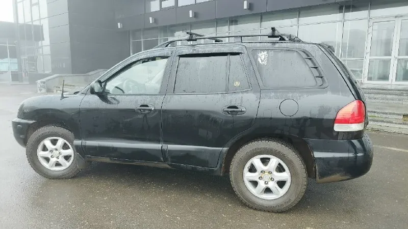 Продам hyundai santa fe classic год выпуска: 2003 поколение: i (2000—2012) пробег: 170 000 км объём двигателя: 2.2 л тип двигателя: бензин коробка передач: автомат привод: передний тип кузова: внедорожник 5-дверный руль: левый мощность: 146 л. с. 4 электростеклоподъемника, круиз контроль, бортовой компьютер, сенсорная магнитола 2 din с видеорегистратором, электрозеркала, автозапуск, противотуманные фары, в комплекте резина зима/лето на титанах, по документам все в порядке, я хозяин, есть нюансы по коробке, по лакокрасочным, цена 450 000 руб, торг, донецк, калининский район. по всем вопросам +79494794671. 📞 звоните: +7(949)4794671 - фотография - 8