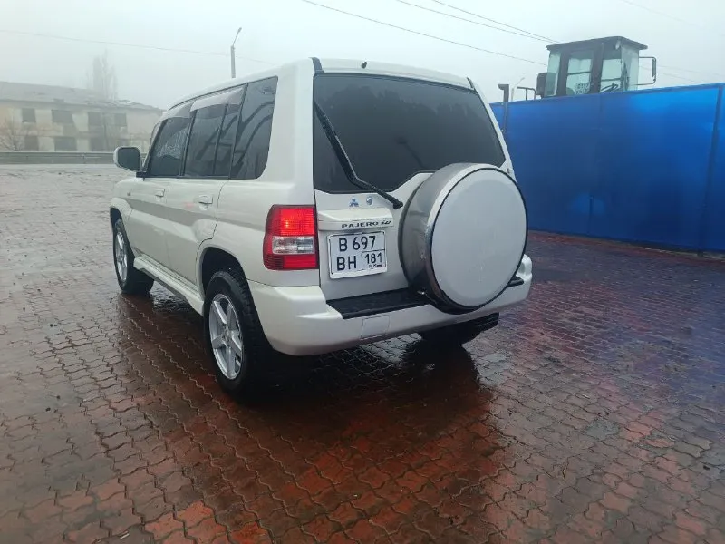 Mitsubishi pajero io 2.0 2005 г. в. пробег 150 тыс. полноценный полный привод с отключаемым передним мостом и блокировкой дифференциала. первый и единственный собственник в рф гур, климат, электрозеркала, 2din android магнитола, led в два этажа, кузов и салон в превосходном состоянии. цена 1🍋 возможен обмен на легковой авто с +79590135288 📞 звоните: +7(959)0135288 - фотография - 2