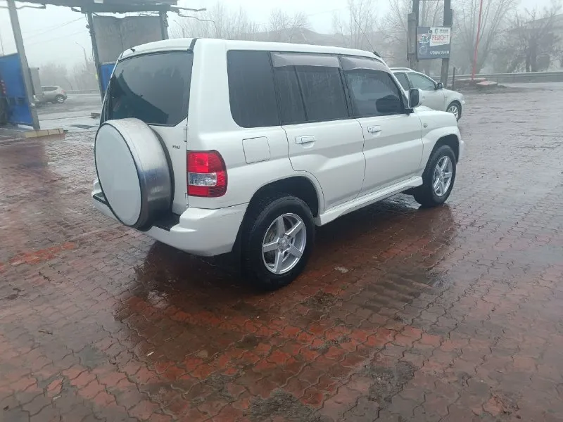 Mitsubishi pajero io 2.0 2005 г. в. пробег 150 тыс. полноценный полный привод с отключаемым передним мостом и блокировкой дифференциала. первый и единственный собственник в рф гур, климат, электрозеркала, 2din android магнитола, led в два этажа, кузов и салон в превосходном состоянии. цена 1🍋 возможен обмен на легковой авто с +79590135288 📞 звоните: +7(959)0135288 - фотография - 3