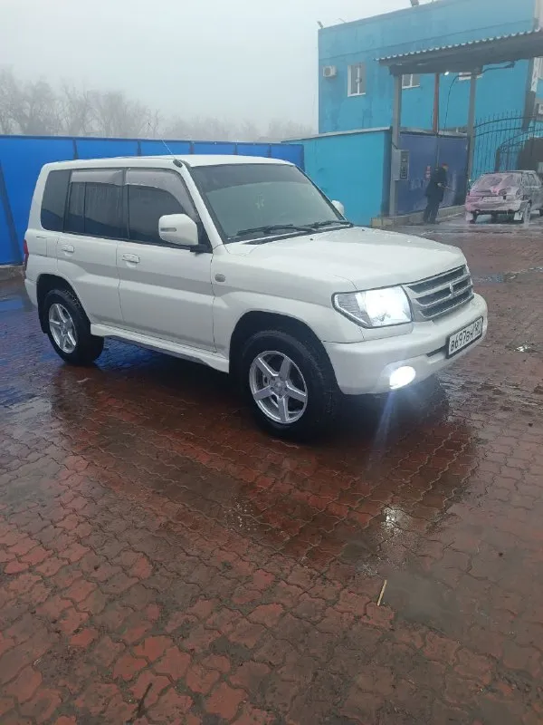 Mitsubishi pajero io 2.0 2005 г. в. пробег 150 тыс. полноценный полный привод с отключаемым передним мостом и блокировкой дифференциала. первый и единственный собственник в рф гур, климат, электрозеркала, 2din android магнитола, led в два этажа, кузов и салон в превосходном состоянии. цена 1🍋 возможен обмен на легковой авто с +79590135288 📞 звоните: +7(959)0135288 - фотография - 5