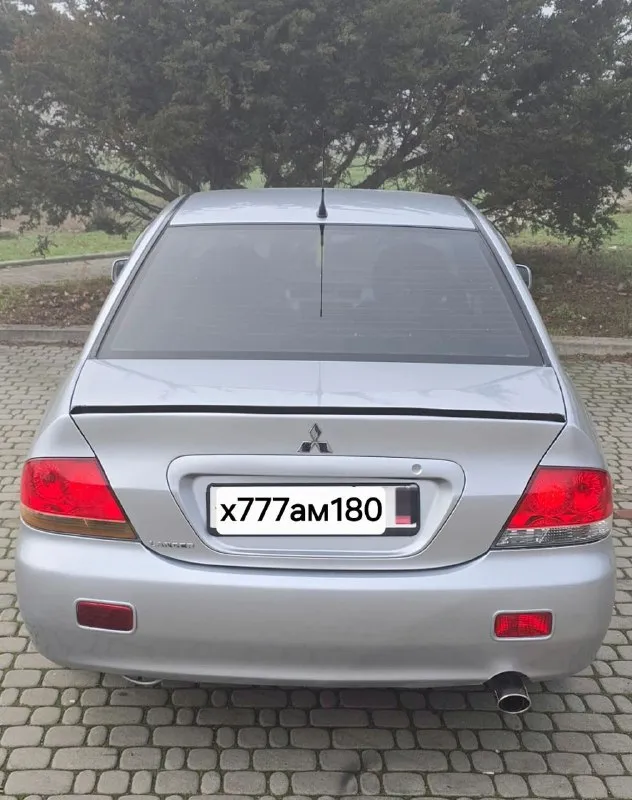 Mitsubishi lancer 9 рестайлинг самой полной комплектации. год выпуска: 2007. техническое состояние на 5+ мотор 1,6 подвеска отрабатывает мягко и комфортно. 🏀 кпп-5ст механика без нареканий. кузов в хорошем состоянии. в дтп не участвовал. в родном металле без ржавчины и гнили. остекление заводское. днище и стаканы лонжеронов в хорошем состоянии. в машине имеется кондиционер (рабочий). airbag srs abs подушки безопасности электроподъемники всех стекол 4 доводчика стекол. гур подогрев сидений. подогрев зеркал. подогрев заднего стекла. электропривод зеркал. серво-руль. цент-замок. хорошая музыка. процессорная магнитола с яндекс навигатором. ютубом и много других функций. задние колонки avatar. передние dl audio barracuda. салон чистый и опрятный в дорогих чехлах из эко-кожи. оригинальные evo-коврики для lancer установлены. дорогие led-лампы osram ledriving hl spring в головном свете. птф-линзы в авто работают все, каждая кнопочка. донецк. +79494491943 +79495609473 цена - 510.000 с хорошим торгом. - фотография - 6
