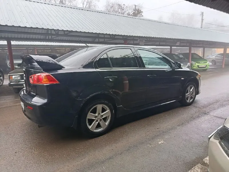 Продам mitsubishi lancer 10 год 2008 мотор 1.6 пробег 200 000 коробка автомат айсин не вариатор владельца 3 состояние авто идеальное мотор работает отлично не дымит не троит тянет хорошо без масла жора. коробка переключает плавно не пинает не буксует. ходовка взбитая без посторонних звуков. электрика вся работает кондиционер холодит отлично в машине очень хорошая печка на зиму готова. кузов без дтп в заводском окрасе кузов без гнили и рыжиков пороги арки в идеале в очень красивой внешке дорогие фары стоят лёд 2 этажа очень хороший свет салон ухоженный все что нужно работать в авто работает так ж второй комплект зимней резины 2 сезона проехала лето тоже в хорошем состоянии авто готова на любые поездки и проверки юридически чисто без штрафов запретов и арестов любой вид оформления кто ищет живой лансер это именно он цена 765 000 торг рассмотрю обмен телефон+79495504164 - фотография - 4
