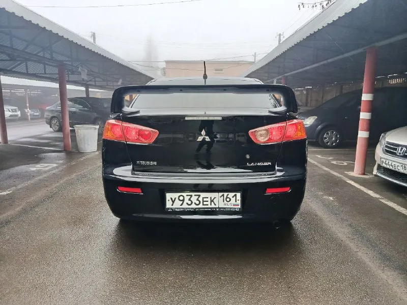 Продам mitsubishi lancer 10 год 2008 мотор 1.6 пробег 200 000 коробка автомат айсин не вариатор владельца 3 состояние авто идеальное мотор работает отлично не дымит не троит тянет хорошо без масла жора. коробка переключает плавно не пинает не буксует. ходовка взбитая без посторонних звуков. электрика вся работает кондиционер холодит отлично в машине очень хорошая печка на зиму готова. кузов без дтп в заводском окрасе кузов без гнили и рыжиков пороги арки в идеале в очень красивой внешке дорогие фары стоят лёд 2 этажа очень хороший свет салон ухоженный все что нужно работать в авто работает так ж второй комплект зимней резины 2 сезона проехала лето тоже в хорошем состоянии авто готова на любые поездки и проверки юридически чисто без штрафов запретов и арестов любой вид оформления кто ищет живой лансер это именно он цена 765 000 торг рассмотрю обмен телефон+79495504164 - фотография - 5