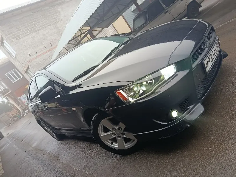 Продам mitsubishi lancer 10 год 2008 мотор 1.6 пробег 200 000 коробка автомат айсин не вариатор владельца 3 состояние авто идеальное мотор работает отлично не дымит не троит тянет хорошо без масла жора. коробка переключает плавно не пинает не буксует. ходовка взбитая без посторонних звуков. электрика вся работает кондиционер холодит отлично в машине очень хорошая печка на зиму готова. кузов без дтп в заводском окрасе кузов без гнили и рыжиков пороги арки в идеале в очень красивой внешке дорогие фары стоят лёд 2 этажа очень хороший свет салон ухоженный все что нужно работать в авто работает так ж второй комплект зимней резины 2 сезона проехала лето тоже в хорошем состоянии авто готова на любые поездки и проверки юридически чисто без штрафов запретов и арестов любой вид оформления кто ищет живой лансер это именно он цена 765 000 торг рассмотрю обмен телефон+79495504164 - фотография - 6