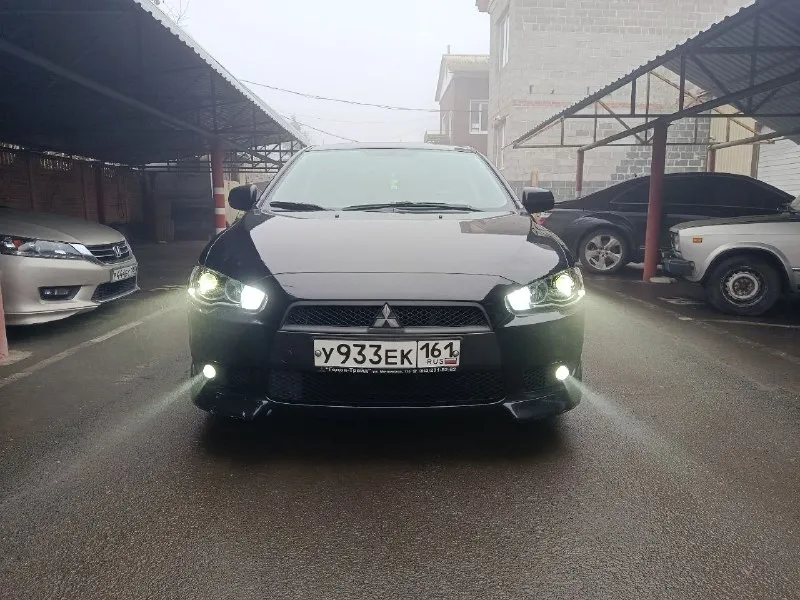 Продам mitsubishi lancer 10 год 2008 мотор 1.6 пробег 200 000 коробка автомат айсин не вариатор владельца 3 состояние авто идеальное мотор работает отлично не дымит не троит тянет хорошо без масла жора. коробка переключает плавно не пинает не буксует. ходовка взбитая без посторонних звуков. электрика вся работает кондиционер холодит отлично в машине очень хорошая печка на зиму готова. кузов без дтп в заводском окрасе кузов без гнили и рыжиков пороги арки в идеале в очень красивой внешке дорогие фары стоят лёд 2 этажа очень хороший свет салон ухоженный все что нужно работать в авто работает так ж второй комплект зимней резины 2 сезона проехала лето тоже в хорошем состоянии авто готова на любые поездки и проверки юридически чисто без штрафов запретов и арестов любой вид оформления кто ищет живой лансер это именно он цена 765 000 торг рассмотрю обмен телефон+79495504164 - фотография - 7