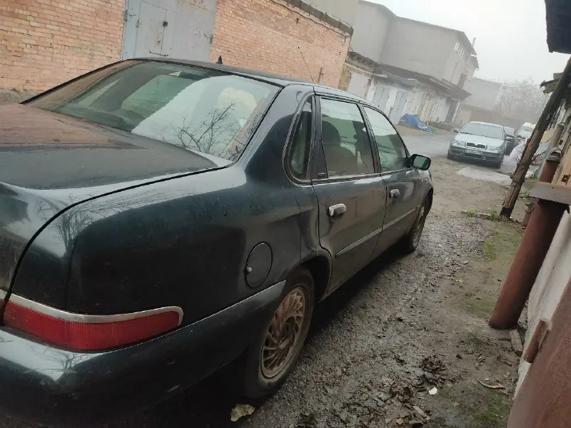 Продам ford скорпио (1997 г. ) объем мотора 2.9 бензин. (нужно выставить зажигание и он поедет в моторе стуков нет никаких лишних звуков выдео как работает мотор могу скинуть в лс ) кпп пятиступенчатая не вылетает не хрусти не гнилой кожанный салон эллектро регулеровка сидений, стеклоподёмники на все 4 двери, центральный замок, кондиционер, есть гур, и многое другое, тормоза все дисковые отличные! ходовка перебрана всё светиться моргает машина едет очень бодро цена 130к переоформление без проблем город донецк номер для связи +79493524315 так же приветствуется обмен 📞 звоните: +7(949)3524315 - фотография - 4