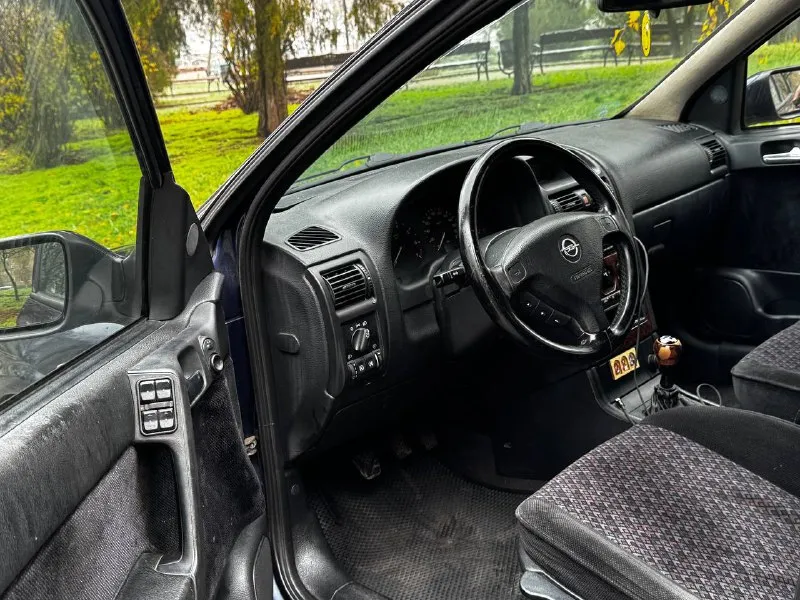 В продаже opel astra g 2000 года выпуска 🔥 цена 295.000 ₽, торг быстрому покупателю! 🔥 автомобиль на моторе 1.6 16v. работает отлично, не троит и не дымит. коробка механика, никаких проблем нет. передачи не выбивает. ходовая обслужена. по кузову есть жизненные моменты. салон в отличном состоянии! новая зимняя резина! автомобиль пригнан из германии. пробег 250.000 км. сервисные книги. хорошая комплектация: мультируль, 4 стеклоподъемника, кондиционер, деревянные вставки в салоне, 6 подушек безопасности. по документам полный порядок осмотр центр донецка 🔥 цена 295.000 ₽, торг быстрому покупателю! 🔥 ☎️ +7 (949) 628-72-17 📞 звоните: +7(949)6287217 - фотография - 9