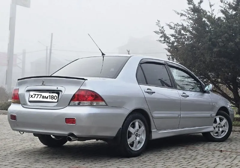 Продам mitsubishi lancer 9 рестайлинг, чистый японец, проверенный надежностью, качеством и комфортом. самой полной комплектации. год выпуска: 2007. в хорошем состоянии по всем параметрам. техническое состояние на 5+ мотор 1,6 отличная динамика работает как швейцарские часы. ⌚️ подвеска отрабатывает мягко и комфортно. 🏀 кпп-5ст механика без нареканий. кузов в хорошем состоянии. в дтп не участвовал. в родном металле без ржавчины и гнили. остекление заводское. днище и стаканы лонжеронов в хорошем состоянии. в машине имеется кондиционер (рабочий). airbag srs abs подушки безопасности электроподъемники всех стекол 4 доводчика стекол. гур подогрев сидений. подогрев зеркал. подогрев заднего стекла. электропривод зеркал. серво-руль. цент-замок. хорошая музыка. процессорная магнитола с яндекс навигатором. ютубом и много других функций. задние колонки avatar. передние dl audio barracuda. салон чистый и опрятный в дорогих чехлах из эко-кожи. оригинальные evo-коврики для lancer установлены. дорогие led-лампы osram ledriving hl spring в головном свете. птф-линзы в авто работают все, каждая кнопочка. литые диски на хорошей всесезонной резине. по документам все отлично. юридически кристально чист. штрафов, запретов, ограничений, обременений нет. любой вид оформления могу присутствовать с вами в гаи при оформлении. пробег 198000. автотека очень хорошая. место осмотра город донецк. +7949 449 1943. +7949 560 94 73. очень плохая связь, если не дозвонились на этих номерах. telegram пишите, звоните. цена - 510.000 с хорошим торгом. с реальным покупателем. в таком состоянии lancer осталось единицы. больше фото или видео обзор отправлю по запросу 📞 звоните: +7(949)4491943 - фотография - 2