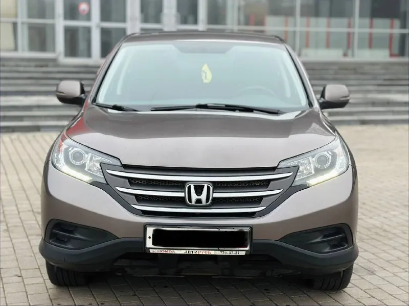 Honda cr-v 2.4 автомат бензин 2015г автомобиль в хорошем состоянии не каких вложений не требует! автомобиль в родном окрасе!!! 1 собственник из самого автосалона!!!! подогрев сидений, круиз-контроль, климат-контроль, мульти-руль, 4wd полный привод, камера заднего вида, парктроник, два комплекта резины, два ключа, с документами полный порядок!!!!! переоформление в мрэо! цена 1.725₽ все вопросы по тел:+79494681080 - фотография - 2