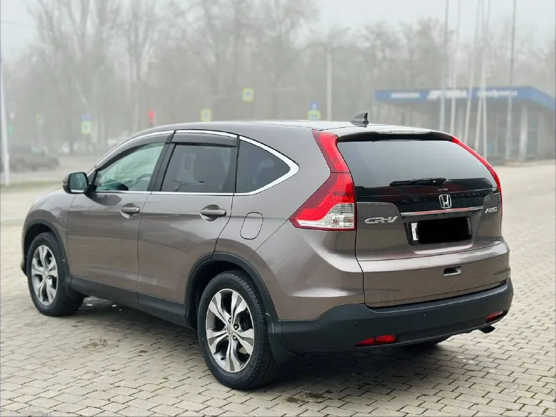 Honda cr-v 2.4 автомат бензин 2015г автомобиль в хорошем состоянии не каких вложений не требует! автомобиль в родном окрасе!!! 1 собственник из самого автосалона!!!! подогрев сидений, круиз-контроль, климат-контроль, мульти-руль, 4wd полный привод, камера заднего вида, парктроник, два комплекта резины, два ключа, с документами полный порядок!!!!! переоформление в мрэо! цена 1.725₽ все вопросы по тел:+79494681080 - фотография - 4