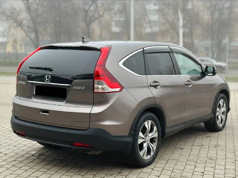 Honda cr-v 2.4 автомат бензин 2015г автомобиль в хорошем состоянии не каких вложений не требует! автомобиль в родном окрасе!!! 1 собственник из самого автосалона!!!! подогрев сидений, круиз-контроль, климат-контроль, мульти-руль, 4wd полный привод, камера заднего вида, парктроник, два комплекта резины, два ключа, с документами полный порядок!!!!! переоформление в мрэо! цена 1.725₽ все вопросы по тел:+79494681080 - фотография - 6