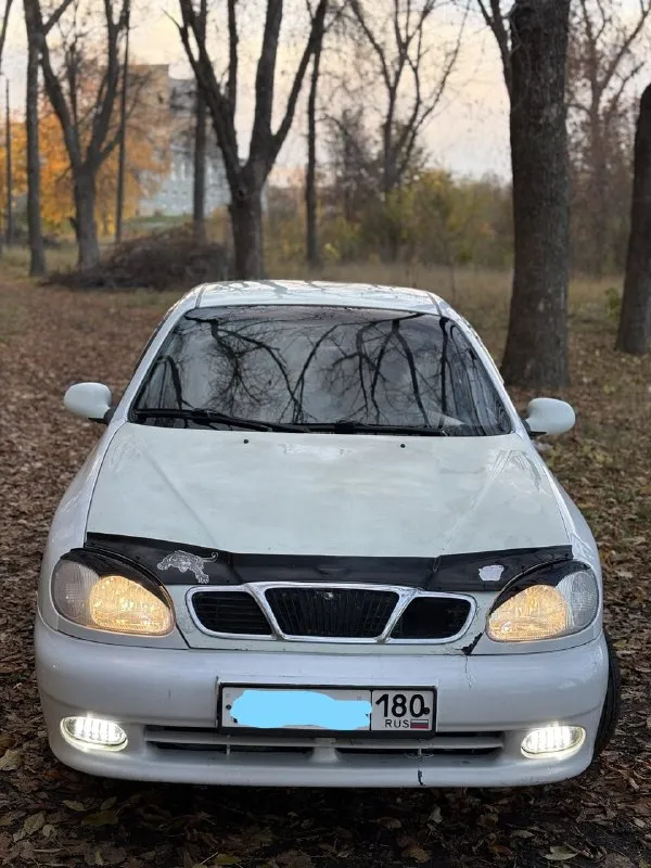 Продам zaz-daewoo 🔥 год выпуска:2002🔥 пробег, км:200.000 🔥 модификация:1.3мт 🔥 тип двигателя:газ/бензин🔥 коробка передач :механика 🔥 привод:передний🔥 тип кузова : легковой седан🔥 koмплeктaция: comfort🔥 цвет: белый🔥 в продаже zaz-daewoo на полном хожу, на автомобиле установлено газовое оборудование, так же авто работает и на бензине. поменян мотор, старый блок лежит в багажнике. установлена сигнализация с центральным замком. стоят красивые диски на хорошей резине. автомобиль на 180 учете, полное переоформление (стс, птс, дкп). установлена магнитола с хорошей музыкой. мотор-заводится с пол оборота, работает хорошо, не троит, не глохнет. кпп-все передачи включаются без хрустов, ничего не выбивает. салон в замечательном состоянии, был переделан под красный цвет, выглядит шикарно. ходовая в замечательном состоянии, едет мягко. так же имеется видео, по просьбе отправлю для более лучшего осмотра авто. цена:175.000 тысяч возможен пригон по договоренности. возможен обмен. номер для связи:+79495752024 - фотография - 1