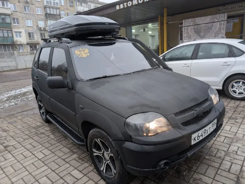 Собственник. нива шевроле 2013г. второй владелец. объем двигателя 1.9 ( легкая шпг, доработая гбц, к... - фотография