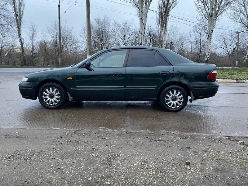 Продаю мазду 626 1998 год мотор 2.0 механика состояние хорошее цена 245₽, днище, пороги целые, технически все нормально, гидроусилитель, стеклоподъемник, кондиционер, мотор коробка работают хорошо, ходовая перебиралась, документы в порядке, переоформление в мрэо, осмотр макеевка, вопросы по тел +79494936731 или +79493145487 торг - фотография - 8