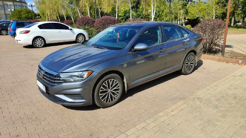 Продам в отличном состоянии всеми любимый, надёжный, технологичный, комфортный и абсолютной беспроблемный авто. лидер продажи и просто бестселлер - volkswagen jetta 7. описание: volkswagen jetta7, дата изготовления 2019 год/ 7 месяц. 📍пробег: 69999км ⚙️ двигатель: 1.4 tsi, 150 л. с., турбо 📀коробка: автомат (8-ступ. aisin) комплектация: • кожаный салон • панорамный люк • бесключевой доступ • круиз-контроль • система предупреждения о фронтальном столкновении • автоматическое экстренное торможение •система start-stop • контроль слепых зон • помощь при выезде с парковки задним ходом • система контроля давления в шинах дополнительно: • полностью русифицирована • 3 ключа. • полностью обслужена, 5 т. км. назад заменена жидкость в • два комплекта шин, лето и зима kumho • сделана антикоррозийная обработка кузова • полностью русифицирована, приборная панель в км. 🚗авто в отличном состоянии, я собственник по птс, вложений не требует. цена: 1 880 000₽ vin: 3vw 📲 tg: @yarikdn85 📞 звоните: +7(949)4385535 - фотография - 3