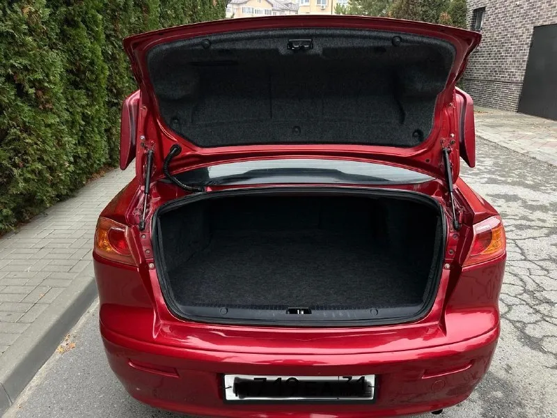 Продаю mitsubishi lancer 2008 г. 1 хозяин мотор 1.5 работает идеально корбка механика, так же без нареканий ! по кузову машина в отличном состоянии, без рыжиков и. тд почти вся в родном окрасе пороги днище целое, заводское пробег 146.000 салон как новый машина вся обслужена, ничего делать не нужно, сел и поехал в машине есть всё для комфортной езды стоят 16 красивые диски цена : 820.000 тел: +7 (949) 559-32-11 +7 (949) 853-09-63 📞 звоните: +7(949)5593211 - фотография - 6