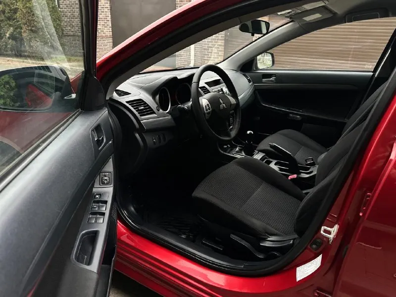 Продаю mitsubishi lancer 2008 г. 1 хозяин мотор 1.5 работает идеально корбка механика, так же без нареканий ! по кузову машина в отличном состоянии, без рыжиков и. тд почти вся в родном окрасе пороги днище целое, заводское пробег 146.000 салон как новый машина вся обслужена, ничего делать не нужно, сел и поехал в машине есть всё для комфортной езды стоят 16 красивые диски цена : 820.000 тел: +7 (949) 559-32-11 +7 (949) 853-09-63 📞 звоните: +7(949)5593211 - фотография - 9