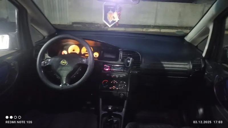 Продам opel зафира а,7-ми местный минивэн. объем двигателя 1.8, бензин пробег 336к км +(машина ездит каждый день) вложений не требует никаких, сел поехал. по комплектации:хорошая родная музыка по 2 колонки в каждой двери, электро зеркала с подогревом,4 эсп, подогрев заднего стекла, люк, хорошая зимняя резина + летняя. осмотр г. амвросиевка. цена 750к + хороший торг. я хозяин, переоформление без проблем. звонить +79493905370 юлия (мама) +79493691787 моя тг все по машине, подробно расскажу если заинтересует. 📞 звоните: +7(949)3905370 - фотография - 4