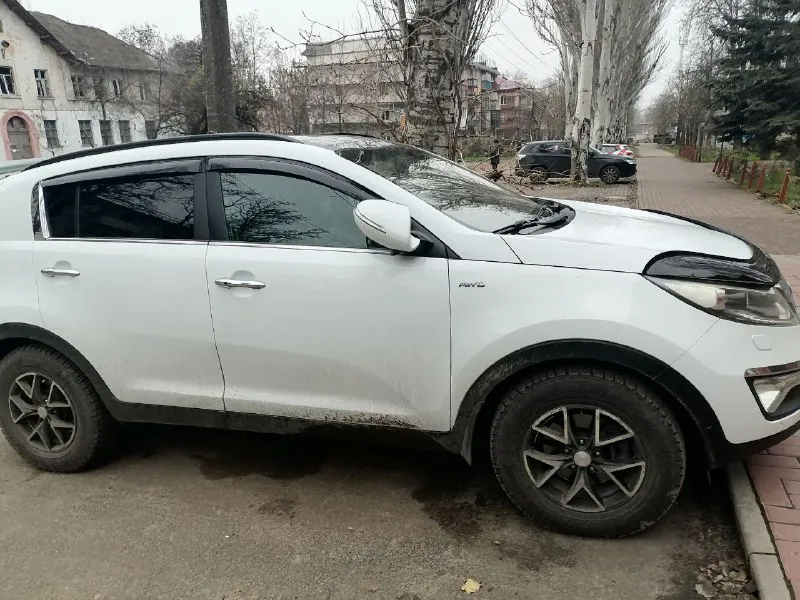 Продам семейный автомобиль kia спортейдж, 2011 года, коробка автомат. Двигатель 1.5. Кожаный салон, панорамная крыша. Состояние хорошее. Новая резина зима-лето. Цена 1.4 млн. Реальному покупателю торг. Собственник. +79497169131. Мариуполь. - фотография - 1