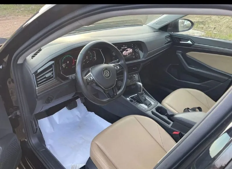 Продам volkswagen jetta sel 2019 год пробег 74000км двс 1.4 турбо(150лс), едет очень бодро, при этом расход топлива смешной. 8-ми ступенчатый автомат(aisin) 4 режима езды ° кожаный салон •цифровая панель приборов (virtuаl сосkрit) •максимальная мультимедиа мiв с саrрlаy •музыка веаts, сабвуфер в багажнике •бесключевой доступ •адаптивный круиз контроль (дистроник) с камерой, подруливанием, удержание в полосе(автомобиль управляется сам) •подогрев сидений •камера заднего вида •датчик света/датчик дождя кованые r18 диски вин по запросу 1.900.000 руб территориально донецк +79494986800 📞 звоните: +7(949)4986800 - фотография - 6