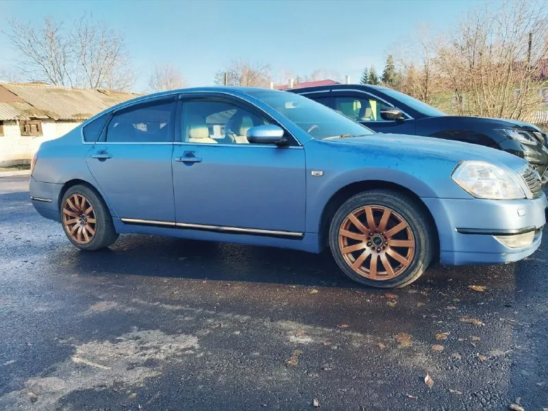 Ниссан тиана 2006 г. 3.5 рестайлинг. в самой полной комплектации!(безключевой доступ, люк, обогрев всех сидений, дополнительное освещение при поворотах, массаж сиденья, память сидений для двоих водителей, абс, система курсовой устойчивости, круиз контроль, раздельный климат контроль 2х зонный, камера заднего вида, 7ми дюймовый монитор, электропривод зеркал, обогрев заднего стекла, салон кожа, гидроуселитель руля, электропривод сидений, управление с задних сидений медиа и подогревом, регулировка руля и другое) по технической части все сделано! двигатель и коробка контрактные, заменены два радиатора, подушки двигателя, подрулевой шлейф и др. , стойки, и всё необходимое по ходовке. два комплекта колес на титанах с новой резиной. ( зимняя резина на родных дисках, летняя на японских широких дисках r17 uras exsol) машина очень комфортная, продаю так как купили новую. 650 000 руб осмотр в харцызске +79490393861 - фотография - 2