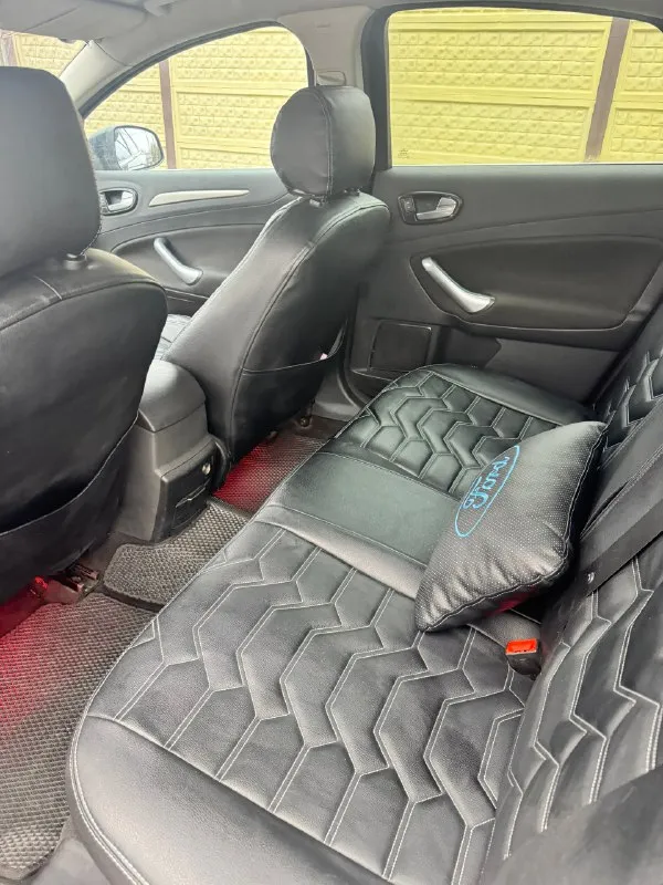 Продам ford mondeo 4, 2007 года выпуска, отличном состоянии! 2 литра, 245 л/с, полностью обслужен, перед продажей сделал замену масла. установлен контрактный двигатель. пробег авто 85000 км, проверен и подтвержден. так же недавно делал ревизию ходовой, что нужно было заменить, заменил, сейчас без посторонних звуков. стоят новые тормозные диски и колодки. кузов авто в хорошем состоянии, ровный, без вмятин и рыжиков, весь в родном окрассе, любые проверки. 🛞подогрев лобового и заднего стекла, обогрев зеркал, esp, abs, ebd, bas, 4 стеклоподьемника, электрорегулировка зеркал, регулировка фар по высоте, противотуманные фары, диски r16 на хорошей зимней резине, двухзонный климат контроль заправлен, датчики света и дождя, подогревы сидений, аудиосистема заменена на тиайс tpro 2. салон сохранился отлично! вся безопасность на месте, сидения не затерты и не порваты, кнопки не затерты, чехлы в идеальном состоянии. есть все для комфортной езды. проблем с запчастями нет от с 📞 звоните: +7(949)3549072 - фотография - 5