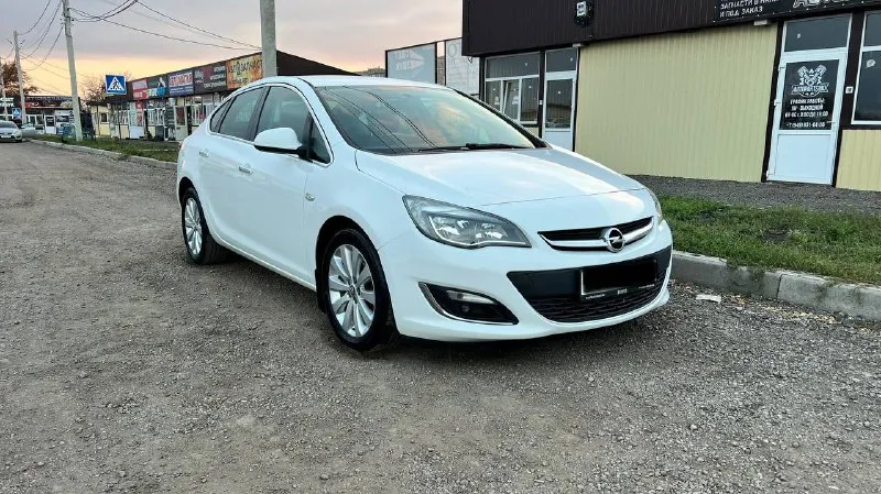 Opel astra j 2014 год 1,4 турбо бензин автомат айсин пробег 163 тыс км космо климат контроль подогре... - фотография