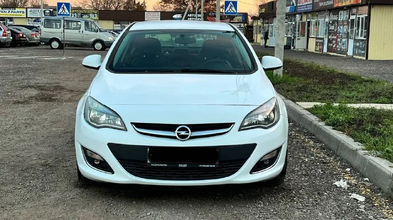Opel astra j 2014 год 1,4 турбо бензин автомат айсин пробег 163 тыс км космо климат контроль подогрев руля подогрев сидений состояние просто огонь! вся в родне два хоза цена 880 тыс руб тел +7949 315 33 70 - фотография - 3