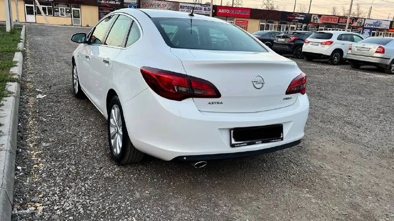 Opel astra j 2014 год 1,4 турбо бензин автомат айсин пробег 163 тыс км космо климат контроль подогрев руля подогрев сидений состояние просто огонь! вся в родне два хоза цена 880 тыс руб тел +7949 315 33 70 - фотография - 4