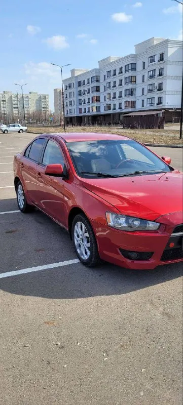 Продам ланцер 2007 год механика, в хорошем состоянии цена 600 т. р. все вопросы по телефону +7949733... - фотография