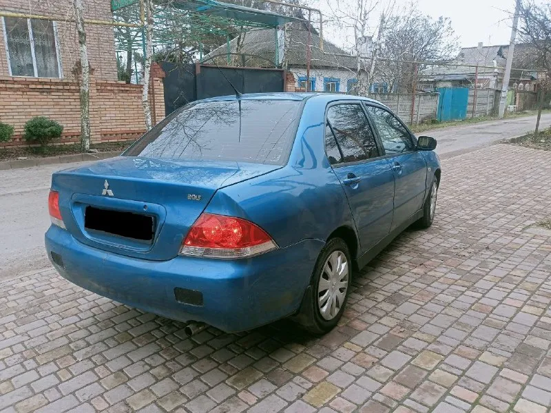 Продам mitsubishi лансер 9 2005г. двигатель 1.6 чувствует себя замечательно работает тихо ровно масло не расходует. коробка механика в полном порядке ходовая мягкая печка греет кондиционер холодит электрика вся исправна зимняя резина документы чистые цена 275000 т. торг символический обмен на газель или что-то в этом роде г донецк +79490921614 телеграм+380710921614 📞 звоните: +7(949)0921614 - фотография - 2