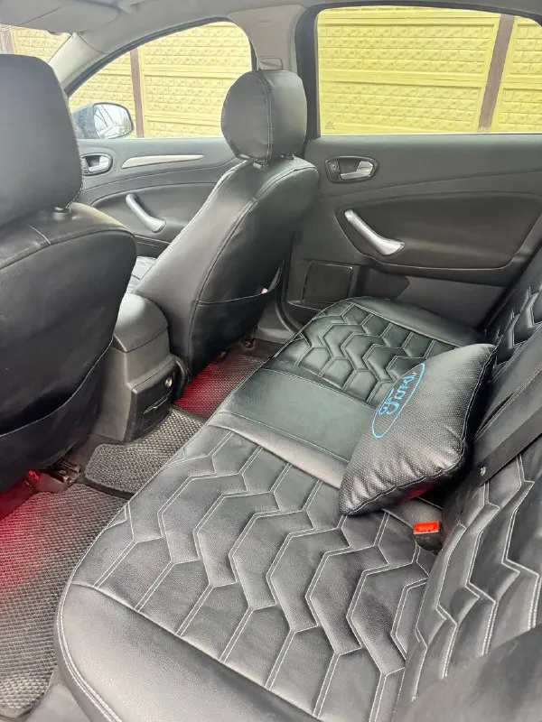 Продам ford mondeo 4, 2007 года выпуска, отличном состоянии! 2 литра, 245 л/с, полностью обслужен, перед продажей сделал замену масла. установлен контрактный двигатель. пробег авто 85000 км, проверен и подтвержден. ходовая в полном порядке! подогрев лобового и заднего стекла, обогрев зеркал, esp, abs, ebd, bas, 4 стеклоподьемника, электрорегулировка зеркал, регулировка фар по высоте, противотуманные фары, диски r17 на хорошей зимней резине, двухзонный климат контроль заправлен, датчики света и дождя, подогревы сидений, аудиосистема заменена на тиайс tpro 2. салон сохранился отлично! проблем с запчастями нет от слова совсем, все доступно и по адекватным ценам! автомобиль d-класса, будете довольны на все 100% все работает, в ближайшее время без вложений абсолютно! за машину не стыдно, любые проверки. документы в полном порядке, без штрафов, залогов и вложений! машина находится в донецке, пролетарский 📲 tg: тамара константиновна 📞 звоните: +7(949)8111702 - фотография - 5