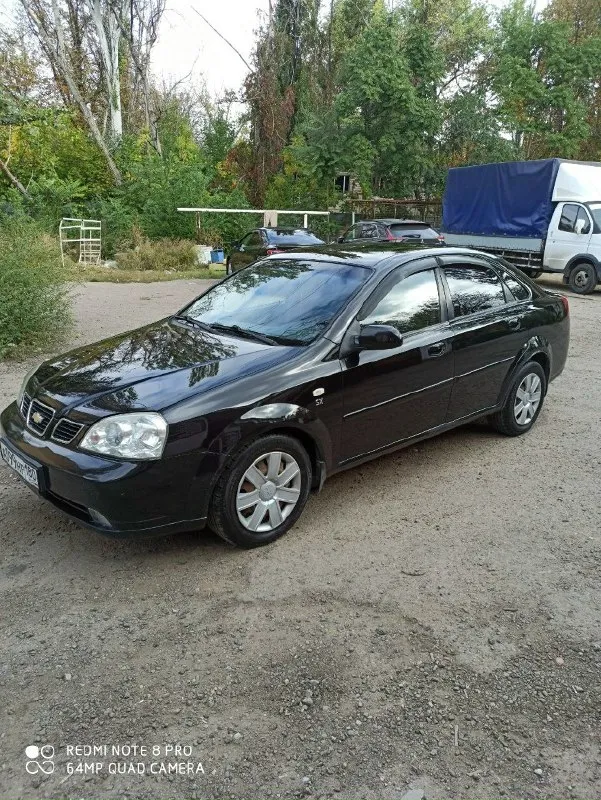 Продам chevrolet нубира 2004 года выпуска, комплектация sx, в отличном состоянии мотор 1.8 в комплектации с гур, кондиционер, передние стеклоподъемники, пробег 156,полностью обслужена, два комплекта резины, цена 520 торг, +79494182794 📞 звоните: +7(949)4182794 - фотография - 2