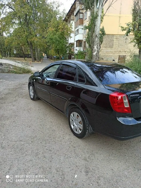 Продам chevrolet нубира 2004 года выпуска, комплектация sx, в отличном состоянии мотор 1.8 в комплектации с гур, кондиционер, передние стеклоподъемники, пробег 156,полностью обслужена, два комплекта резины, цена 520 торг, +79494182794 📞 звоните: +7(949)4182794 - фотография - 4